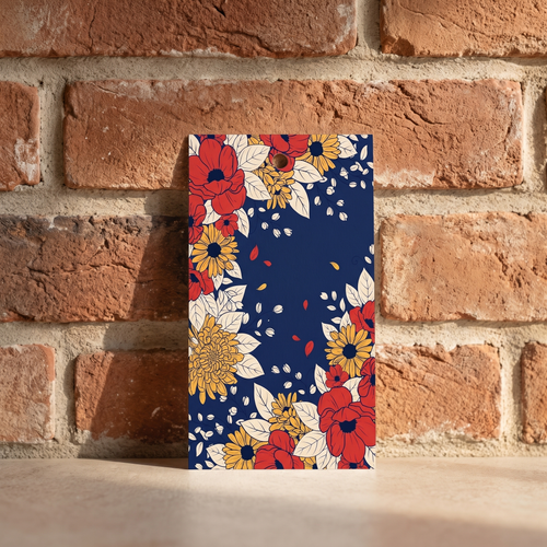Red poppy, gold sunflower and chrysanthemum floral pattern printed on deep navy card, shown on the back of the personalized gift tag